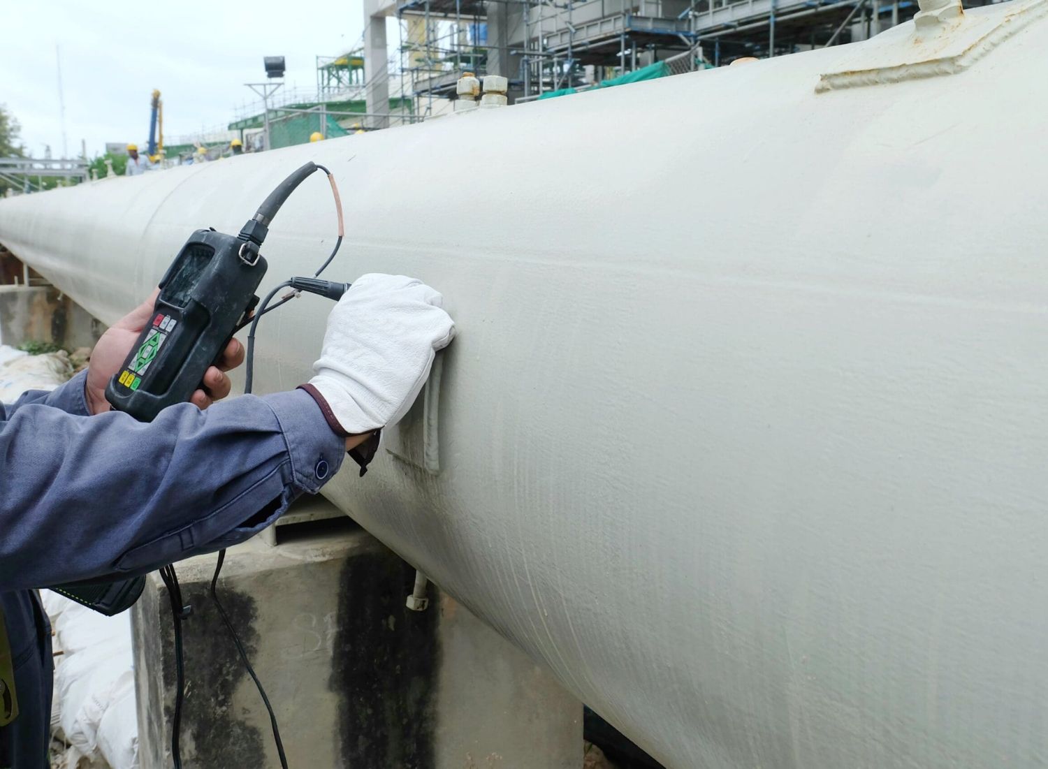 Barcol hardness tester being used on polymer surface for indentation measurement